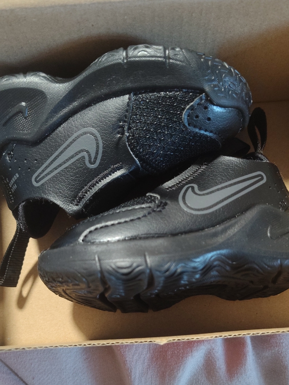 Nike Kids Black Slip-On Athletic Sneakers with Reflective Swoosh